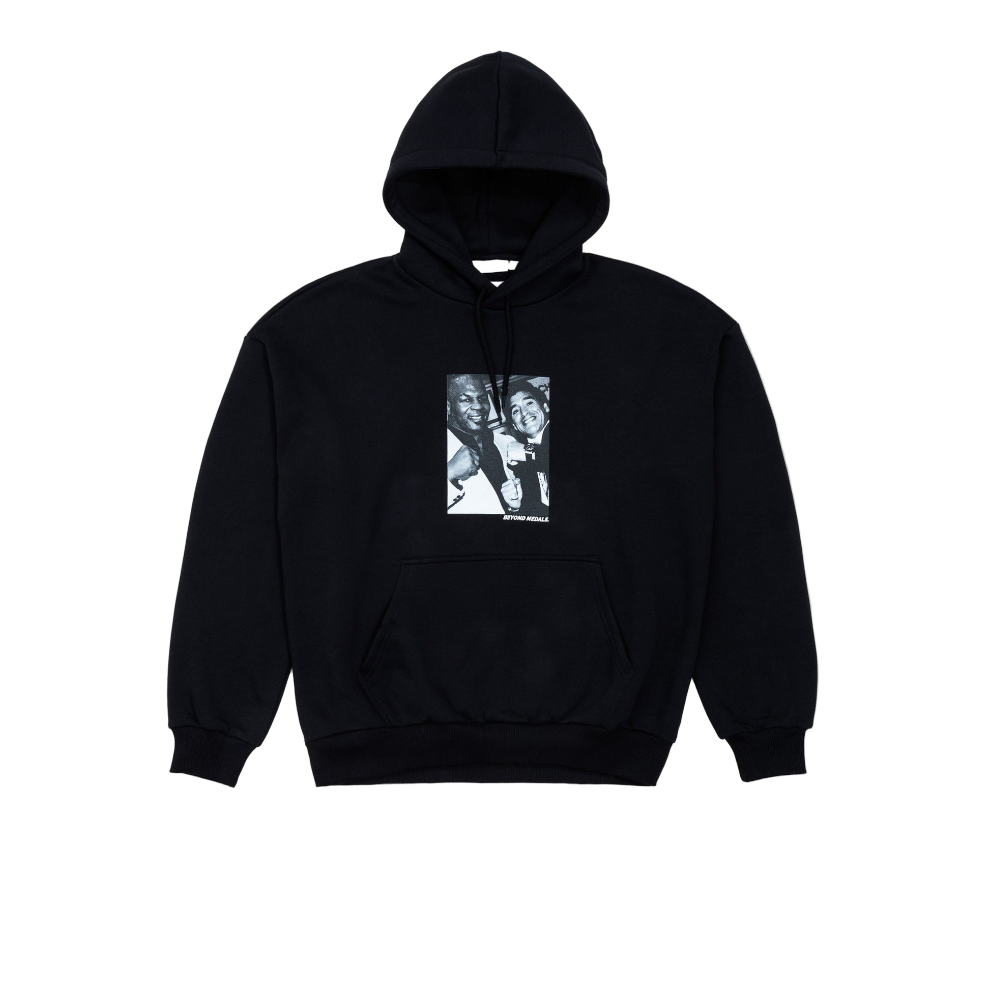 Black hoodie with a graphic design on a light gray background